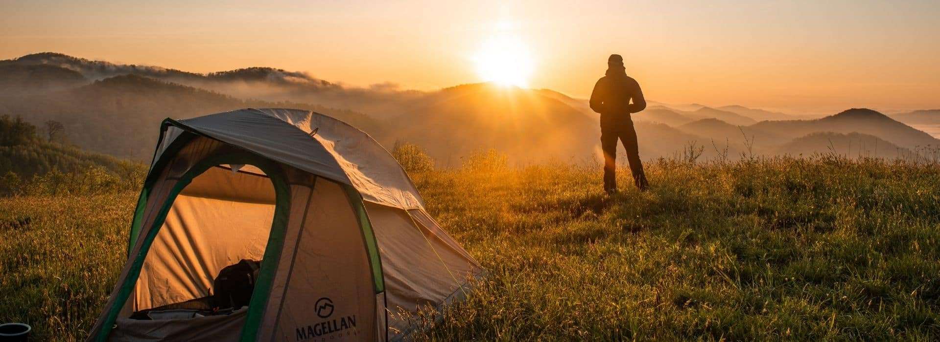 man camping at sunrise in Cyprus